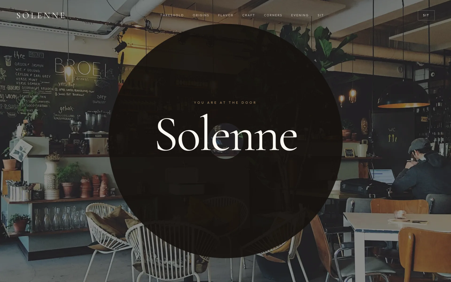 Live Solenne café homepage — threshold hero over the café interior with Sit in the header